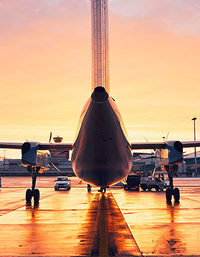 Child in an airport sitting down